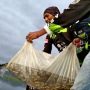 Pulihkan Ekosistem, Komunitas Mancing BMWC Tanam Ribuan Benih Ikan di Waduk Cirata
