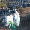 Puing pesawat Yeti Airlines yang jatuh pada Minggu 15 Januari 2023 di wilayah Pokhara Nepal. (twitter@rahulsah11543)