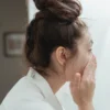 https://www.pexels.com/photo/side-view-of-woman-washing-her-face-7623581/